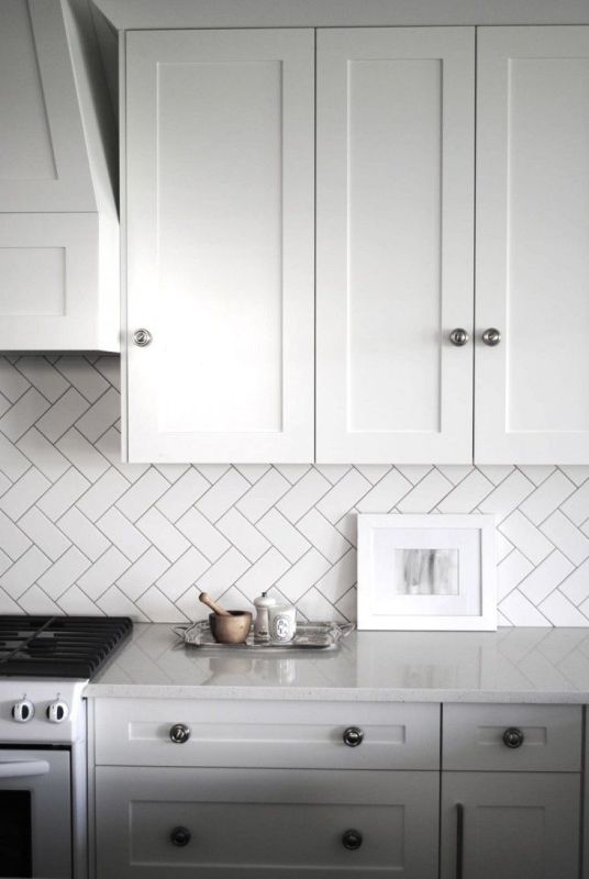 Elegant White Dove Cabinets with Subway Tiles