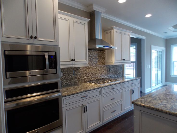 Enhance Your Kitchen's Look with Alabaster Cabinets featuring Pewter Glaze Finish