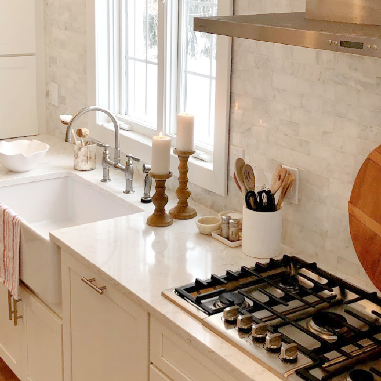 Minuet Quartz Countertops paired with White Dove Cabinets