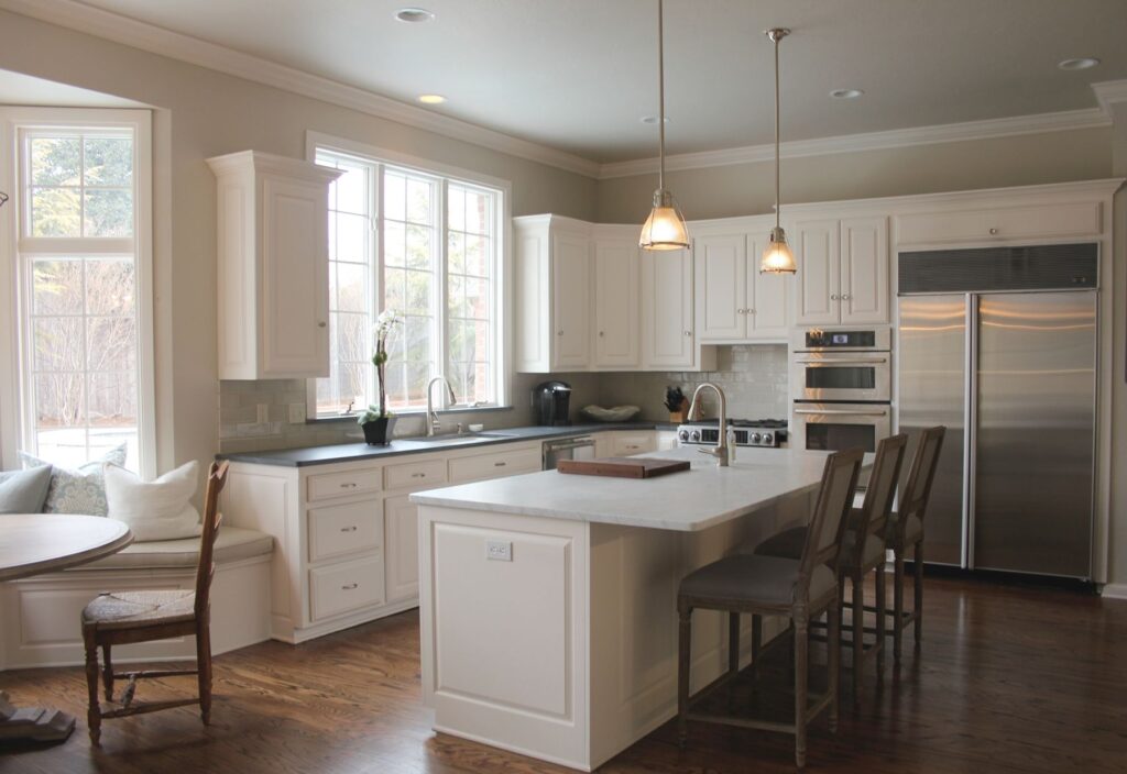 Stylish White Dove Cabinets With Revere Pewter Walls for a Modern Kitchen