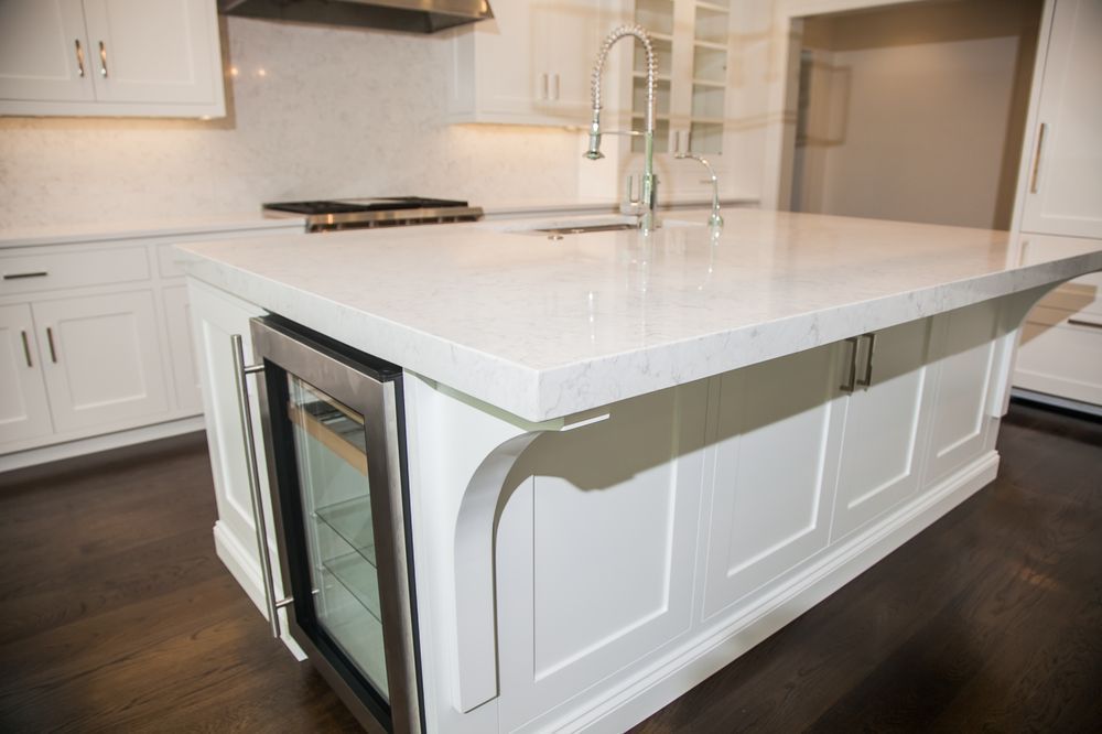 White Dove Cabinets and Durable Granite Countertops