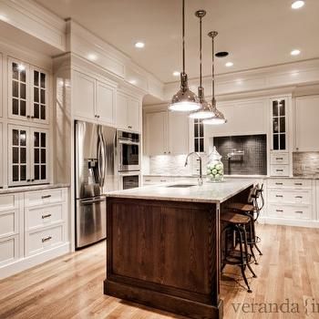 Elegant Kitchen Design with Dove White Cabinets And Dark Countertops